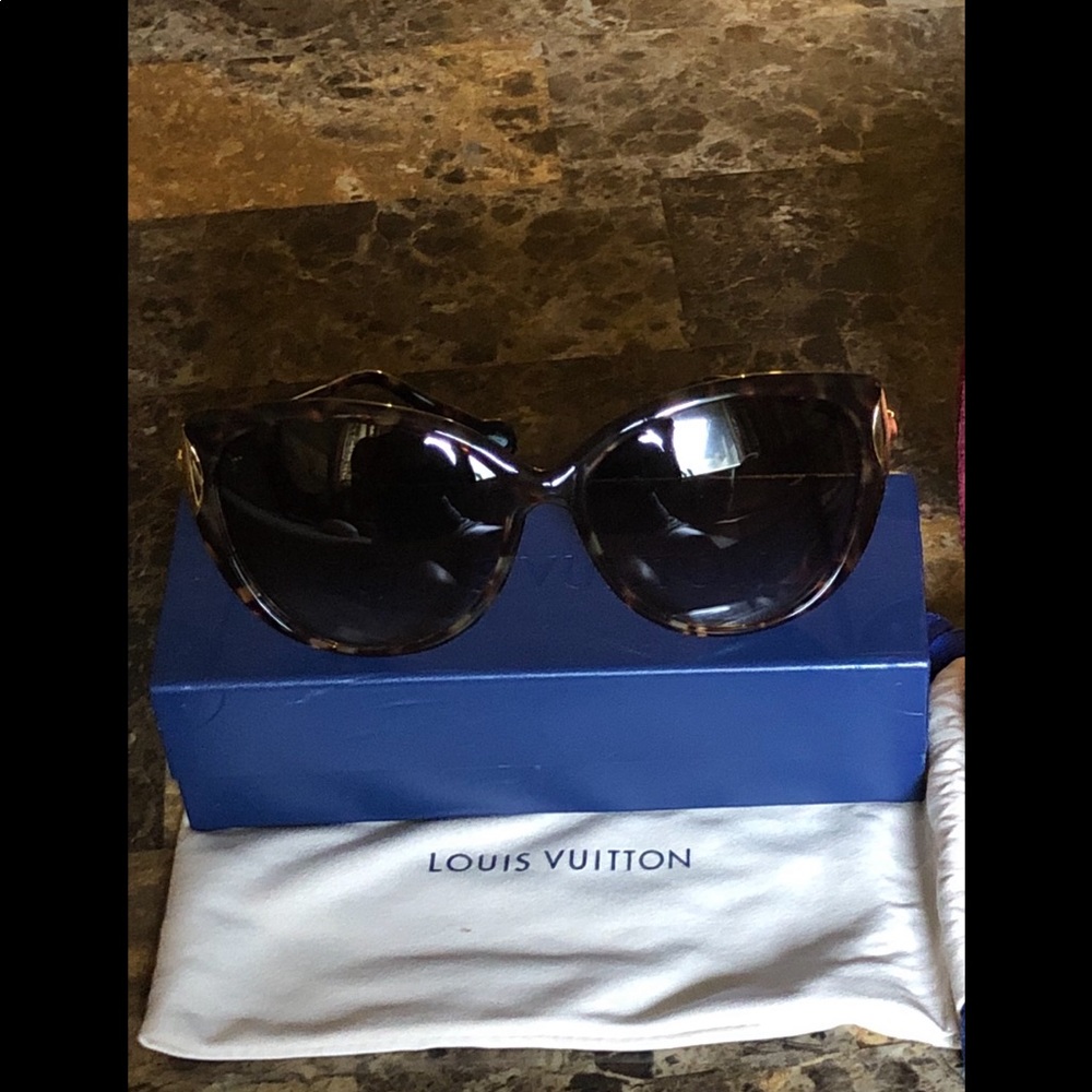 Women’s Louis Vuitton Sunglasses.